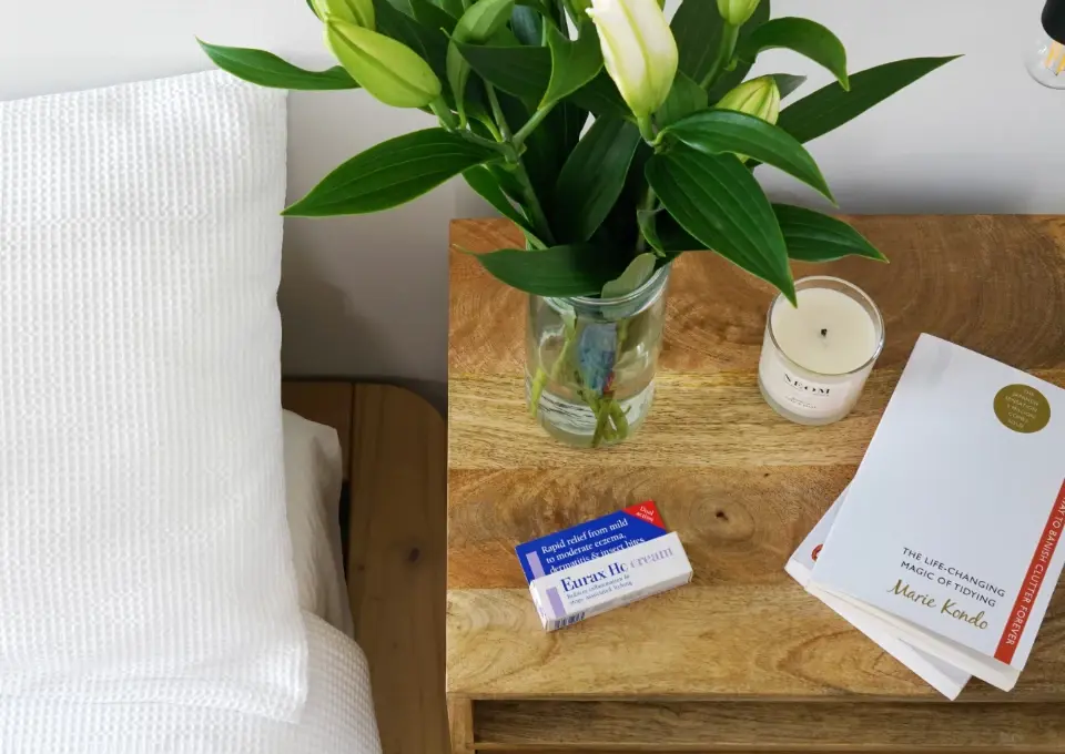 Eurax HC cream on a bedside table
