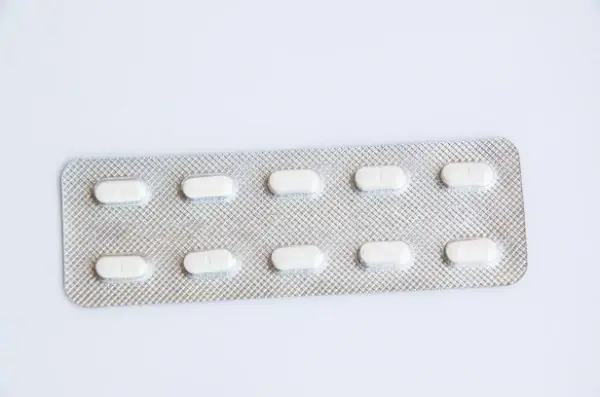 allergy medicine tablets on white background